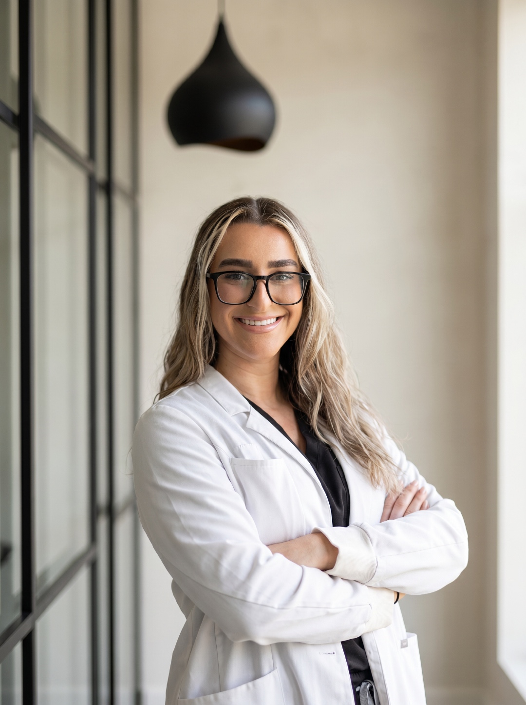 Dr. Jenna Debbs, cosmetic and restorative dentist at The Dental Spot in Mooresville, NC